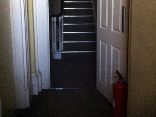 Fire extinguisher moonlighting as door stopper?